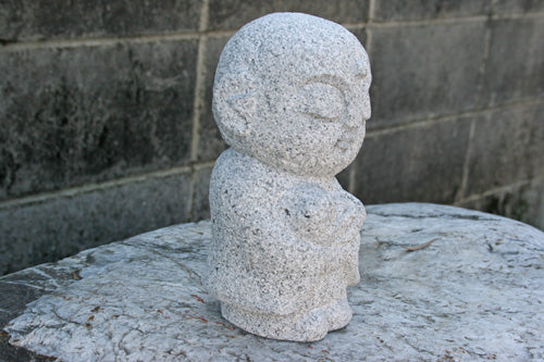 Japanese Jizo Statue Holding a Child – Granite Guardian Sculpture