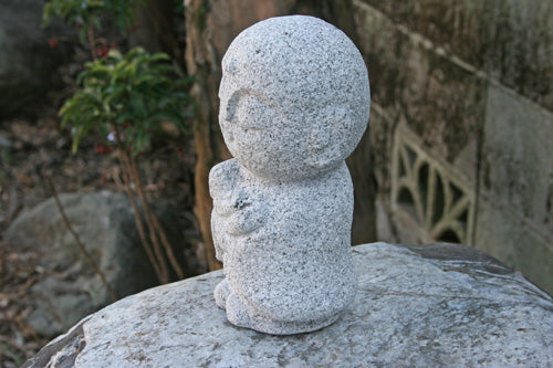 Japanese Jizo Statue Holding a Child – Granite Guardian Sculpture