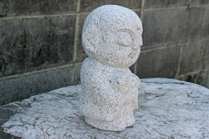 Japanese Jizo Statue Holding a Child – Granite Guardian Sculpture